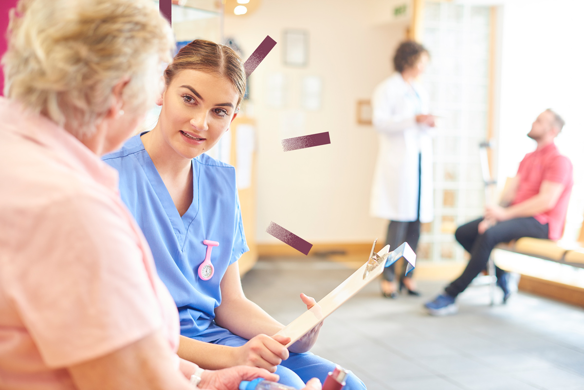 A nurse taking an elderly patients details